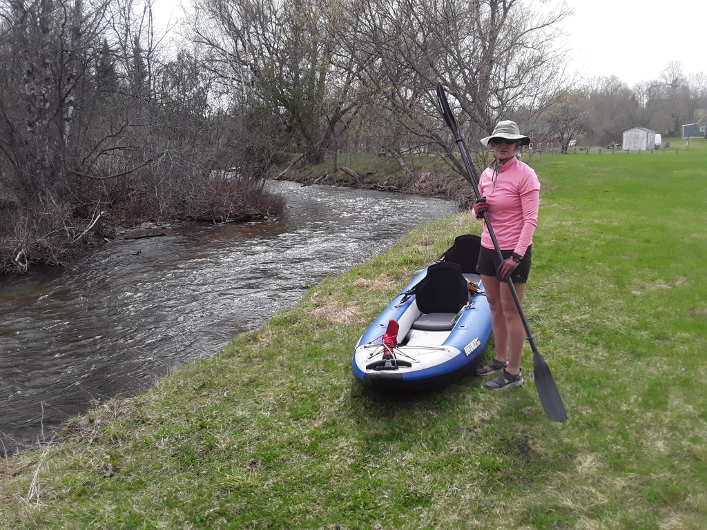 Paddling with an inflatable Sea Eagle tandem kayak on the Sturgeon River, near Wolverine, Michigan.