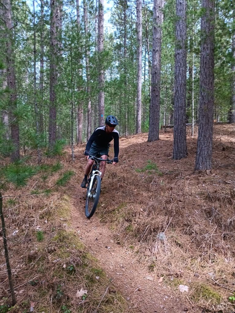 Mountain biking on the High Country Pathway in Michigan. 